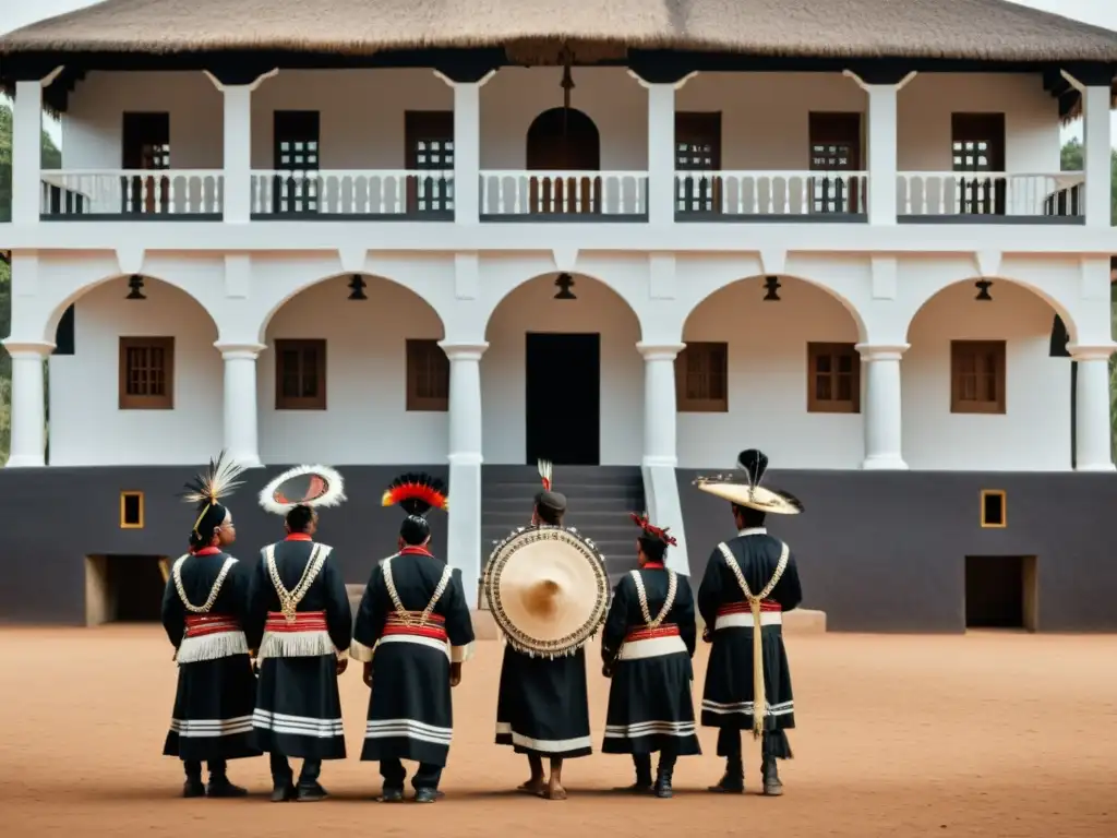 Grupo indígena en ceremonia frente a edificio colonial, mostrando la restitución del patrimonio cultural colonialismo